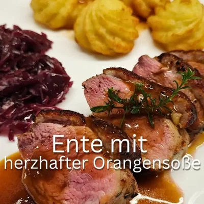 Zarte Ente mit Herzoginkartoffeln und Rotkohl