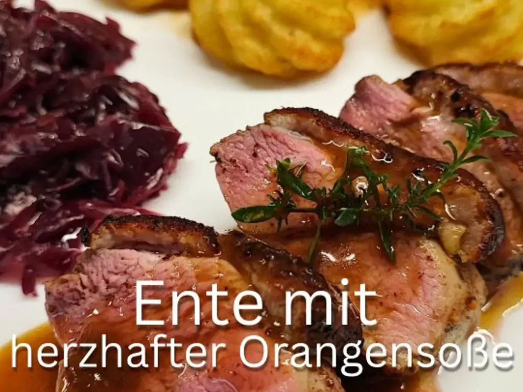 Zarte Ente mit Herzoginkartoffeln und Rotkohl