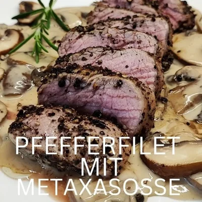Pfeffersteak mit Metaxa-Sahnesauce und Champignons