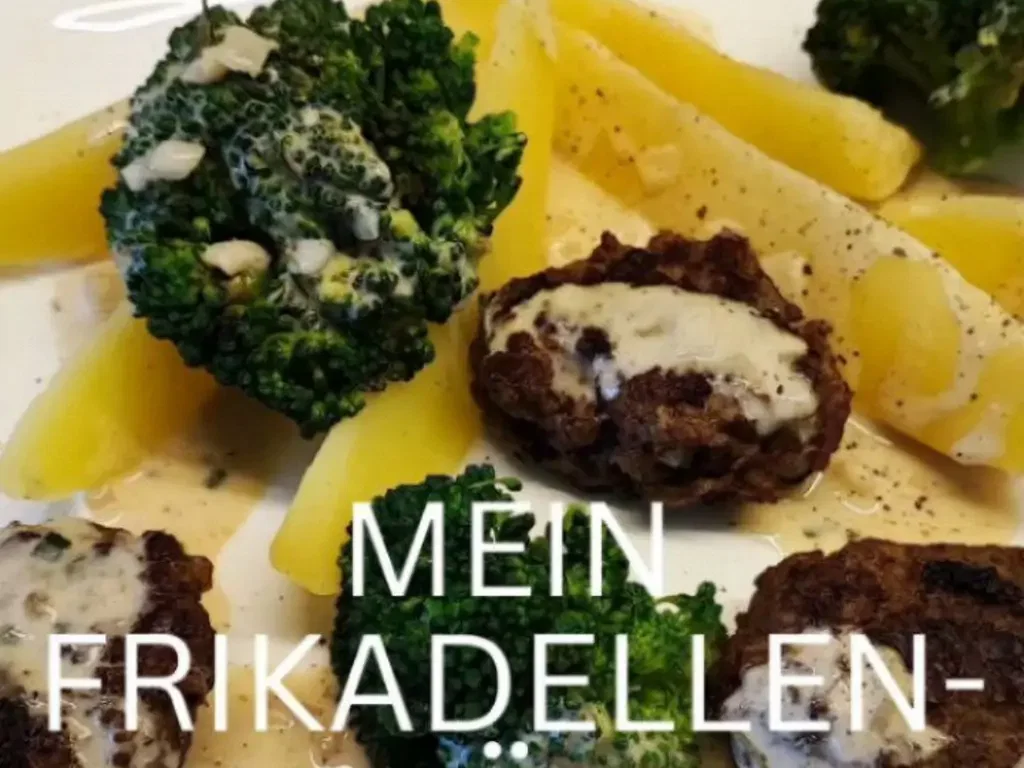 Klassische Frikadellen mit Kartoffelspalten und Brokkoli