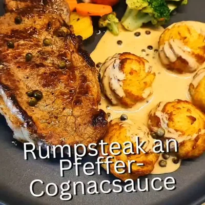 Rumpsteak mit Cognac-Sauce und grünen Pfefferkörnern