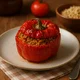 Klassische gefüllte Paprika in Tomatensauce – Bild 1