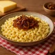 Käsespätzle mit Röstzwiebeln aus der Pfanne – Bild 1