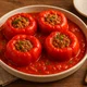 Klassische gefüllte Paprika in Tomatensauce – Bild 2