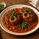 Ossobuco alla Milanese (geschmorte Kalbshaxe mit Knochenmark) – Bild 1