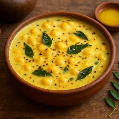 Gujarati Kadhi – süßlich-säuerliche Joghurt-Kichererbsenmehl-Soße